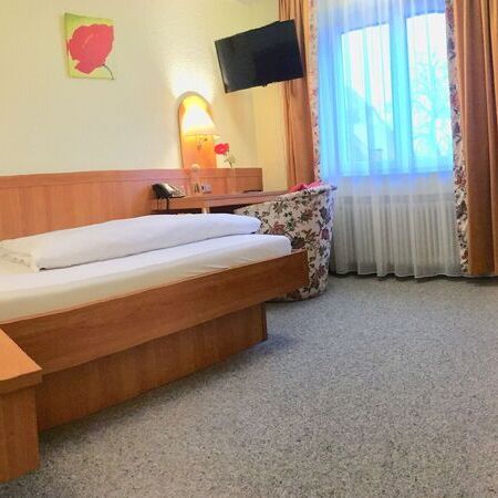Einzelzimmer Comfort mit 1,40 x 2,00 m Bett